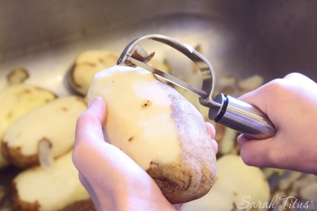 Peeling potatoes for a Craveworthy Potato Salad