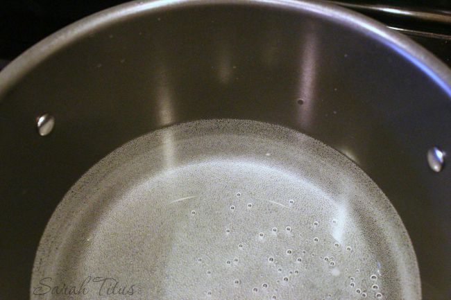 Metal pan with water starting to boil for Alfredo Pasta