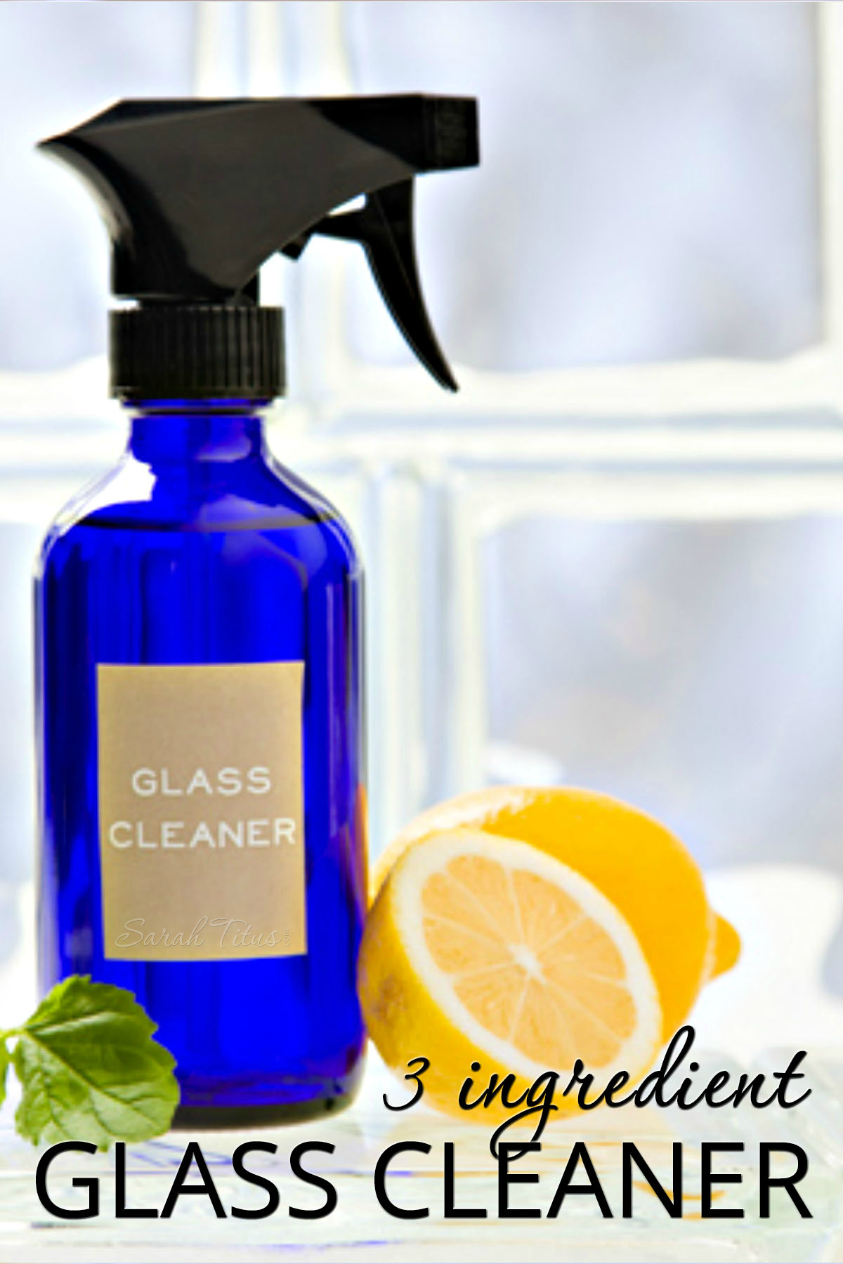 This 3 ingredient homemade window cleaner not only gives you a streak free shine on glass, you probably already have the ingredients in your home right now! #vinegar #water #essentialoils