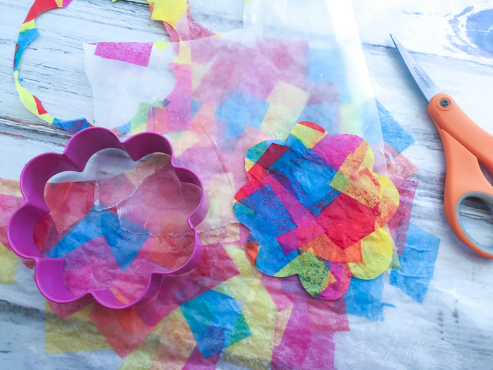 These tissue paper suncatchers are so fun to make and they keep the little ones entertained for hours! Put ribbon on the ends and fly them around the house like a kite!