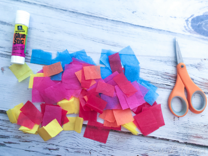 These tissue paper suncatchers are so fun to make and they keep the little ones entertained for hours! Put ribbon on the ends and fly them around the house like a kite!