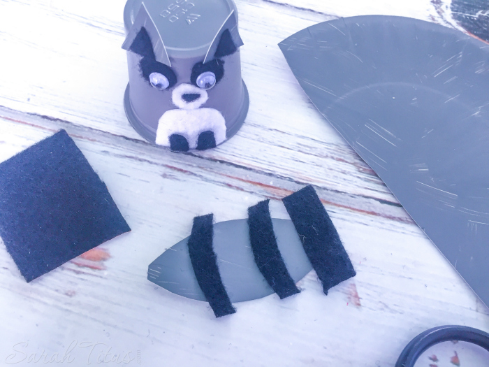 Attach little raccoon ears and make tail for K cup raccoon