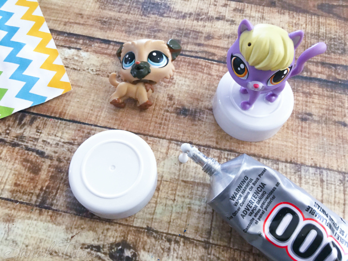 Glue Littlest Pet Shop figures to small lid with glue