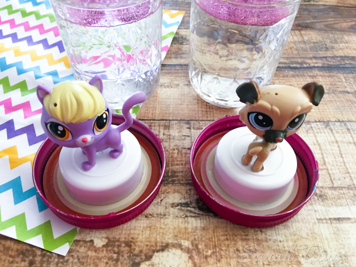 The liquid filled mason jars with the Littlest Pet Shop characters glued to the lids