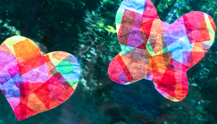 These tissue paper suncatchers are so fun to make and they keep the little ones entertained for hours! Put ribbon on the ends and fly them around the house like a kite!