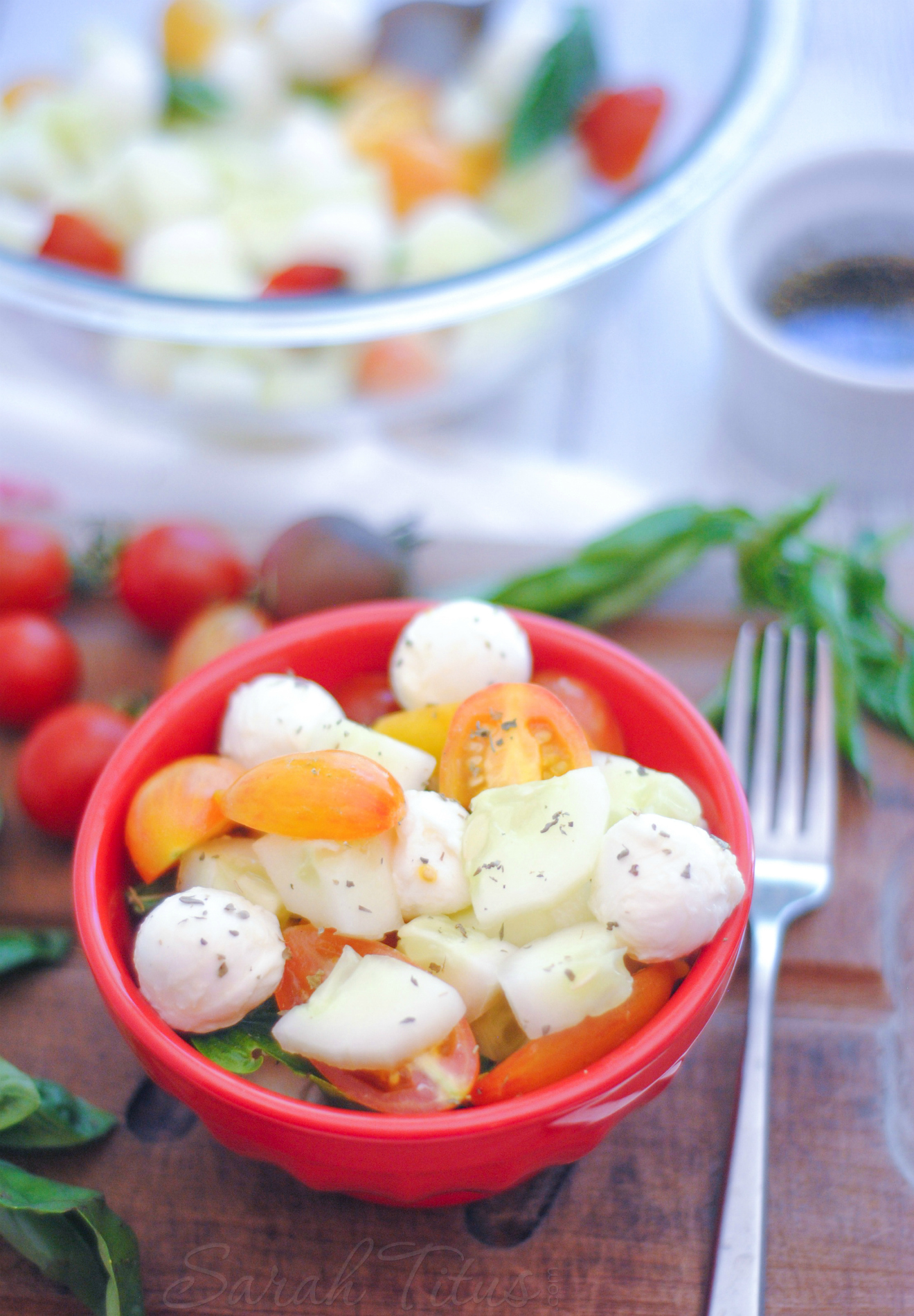 This Cucumber and Tomato Caprese Salad marries the flavors of tomato, basil, and mozzarella cheese together perfectly. This is one salad recipe you won't want to miss!