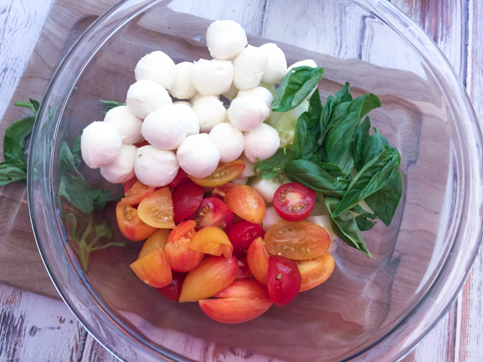 This Cucumber and Tomato Caprese Salad marries the flavors of tomato, basil, and mozzarella cheese together perfectly. This is one salad recipe you won't want to miss!