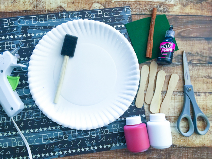 Supplies for Paper Plate Apple {Kids Craft} including glue gun, paint sponge, paper plates, paint, popsicle sticks and scissors