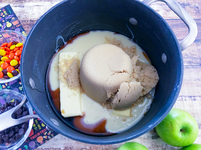 Combining butter, brown sugar, corn syrup, sweetened condensed milk, and sea salt in a large pan