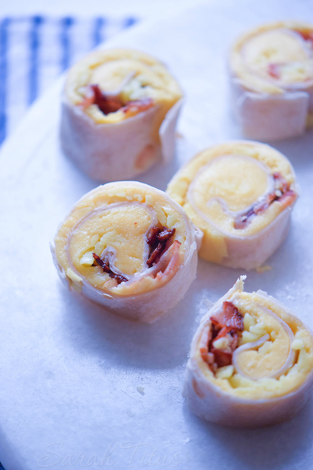 Perfect for your next get-together or add them to your husband's lunch box, these cheddar bacon ranch roll ups are super creamy and packed with the bold flavors of bacon and ranch.