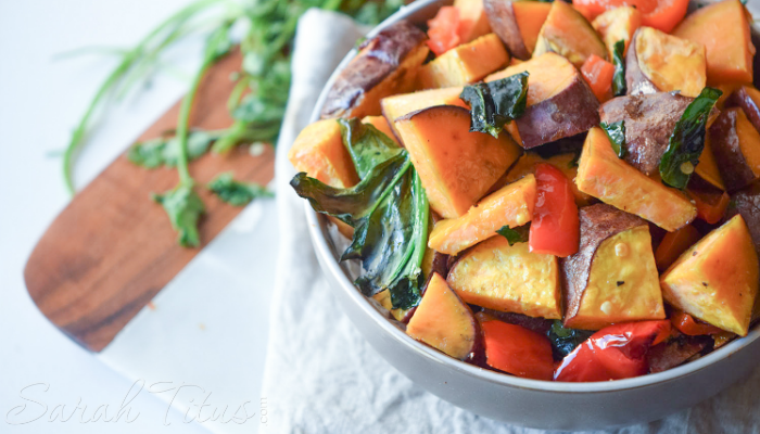 Bowl full of Sweet Potato Bake made with sweet potatoes, red peppers and spinach