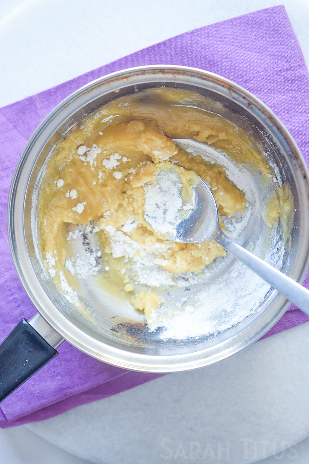 Melting butter in a pan preparing to make potato soup