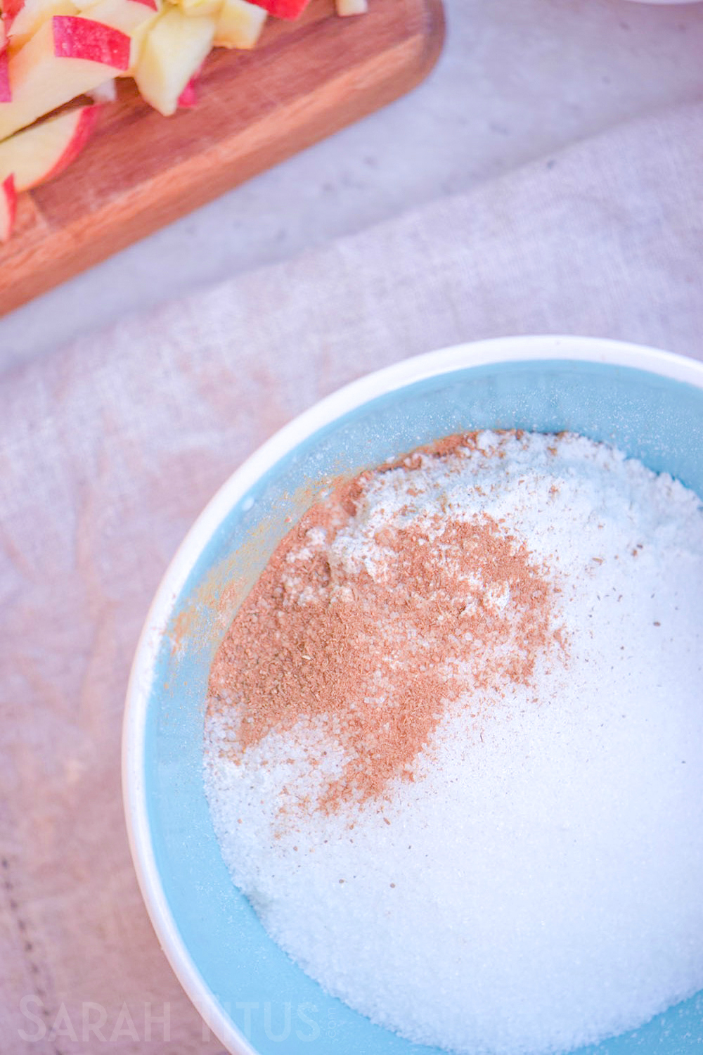 In a blue bowl mixing the flour, baking powder, salt, and cornstarch.