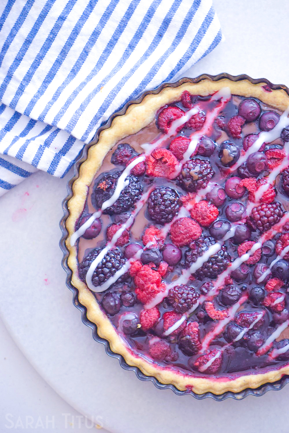 Everyone loves chocolate, am I right? This Chocolate Berry Pie is a non-traditional spin on chocolate pie paired with 3 types of berries. You'll adore it!