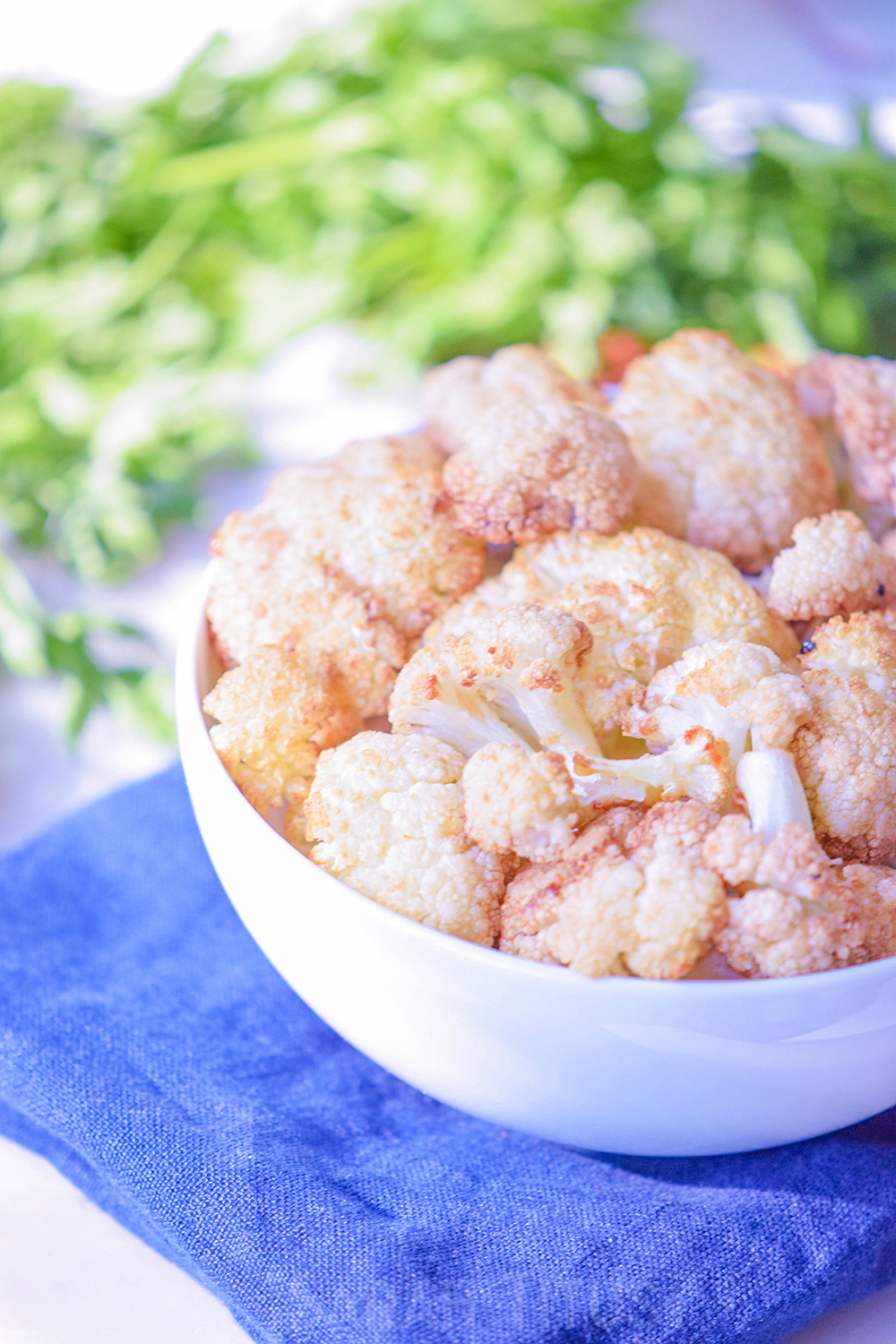 These Sticky Cauliflower Bites make a great side dish for family dinners or appetizer at your next get-together and are the perfect way to get your kids hooked on veggies!