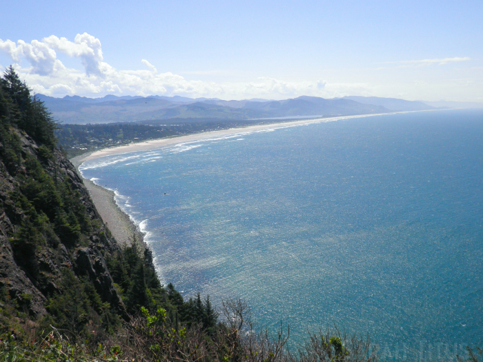 Beautiful ocean picture with mountains and clouds