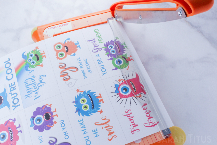 Trimming colorful monster Valentine's Day cards
