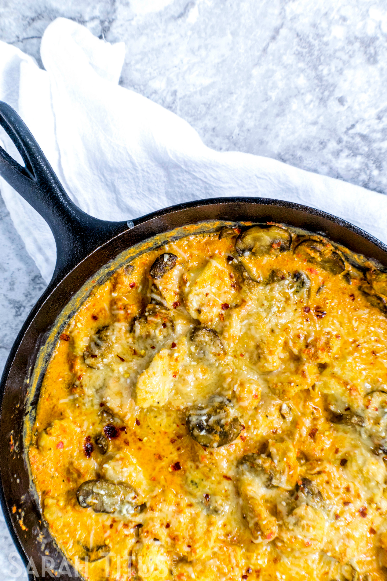 Creamy Chicken with Mushrooms in a cast iron skillet