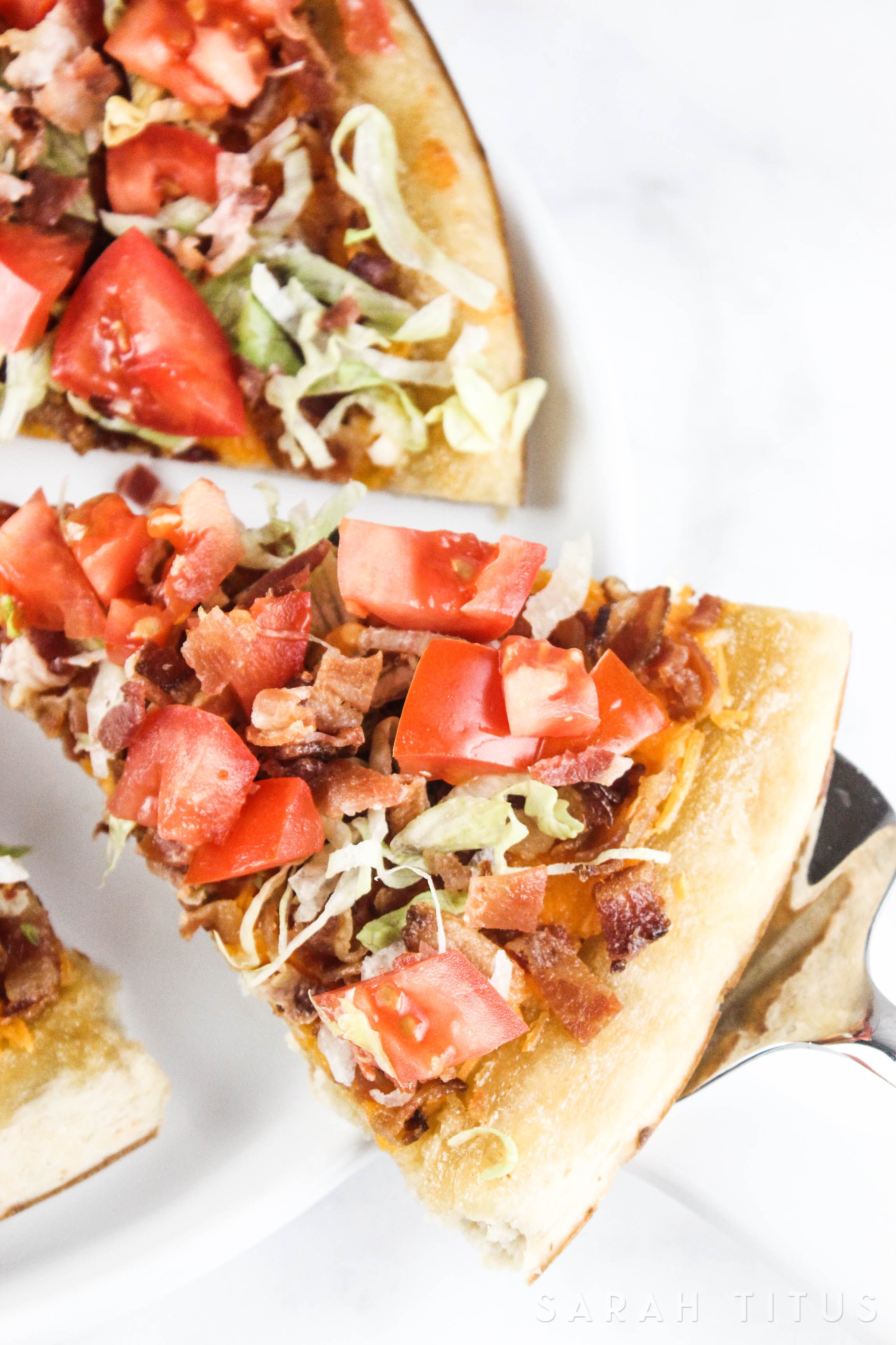 Have you ever been in a position where your family is really hungry and they want to eat right away? This BLT Pizza is the perfect recipe for you to make in those busy times. Plus, it's absolutely delicious! 