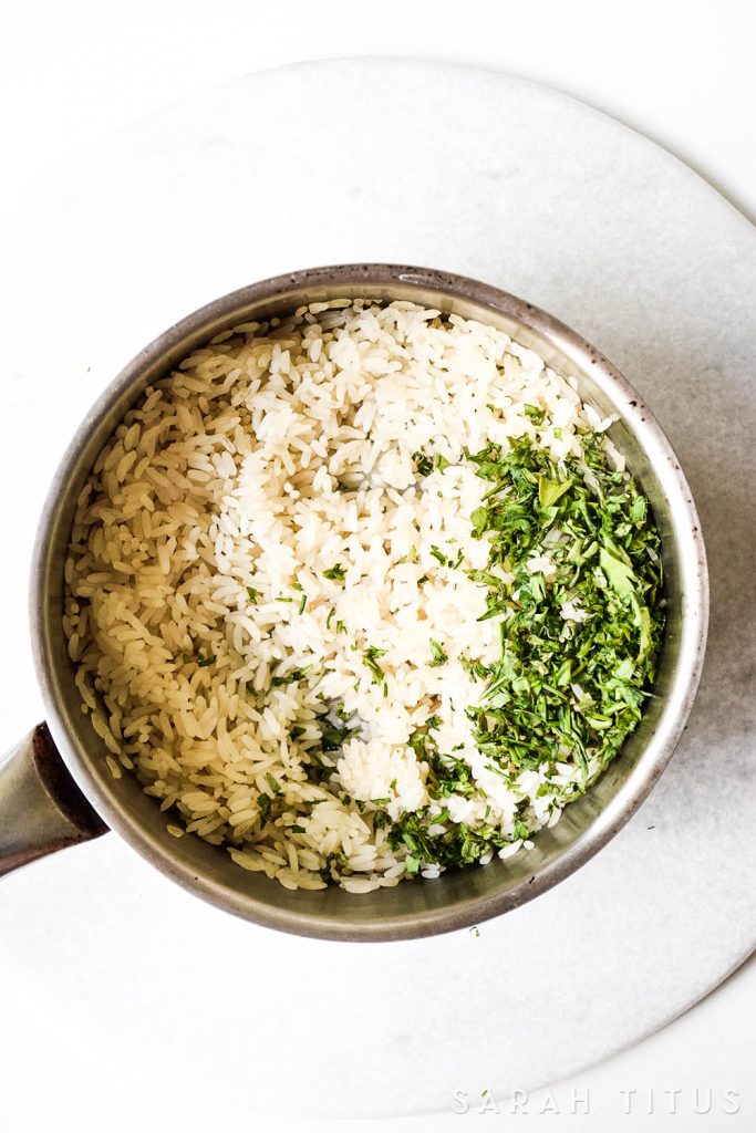 Rice is a great inexpensive side dish to add your dinner, but it is often bland and boring. This Lime Cilantro Rice is neither bland, nor boring and will have your family asking you to make more of it!