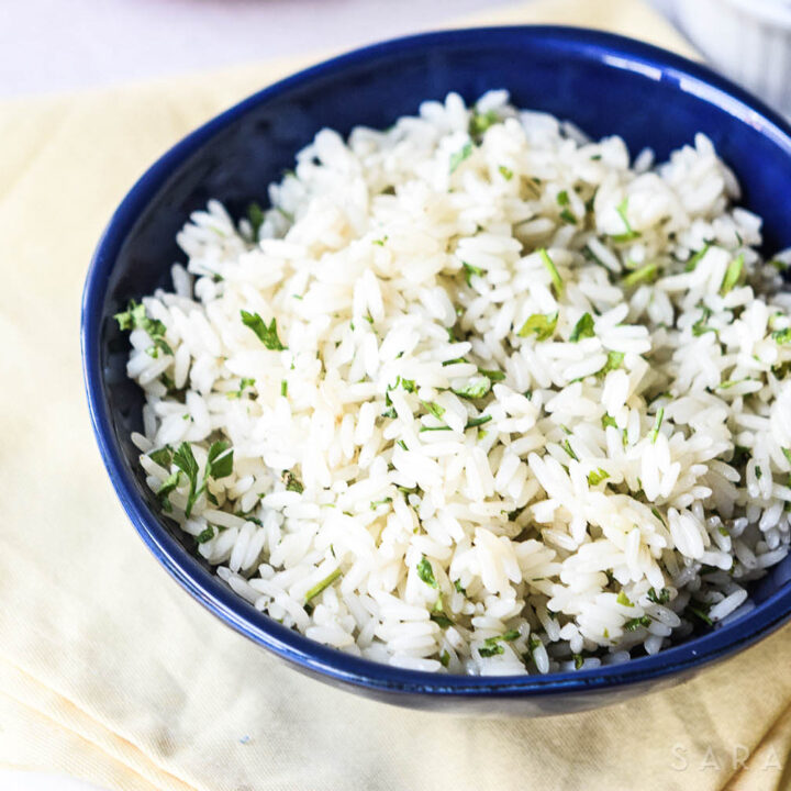 Rice is a great inexpensive side dish to add your dinner, but it is often bland and boring. This Lime Cilantro Rice is neither bland, nor boring and will have your family asking you to make more of it!