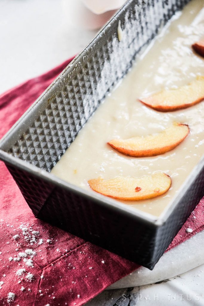 This Yogurt Peach Cake is delicious for dessert or breakfast! It is made with Greek yogurt; so you get your fruit, protein, and calcium!