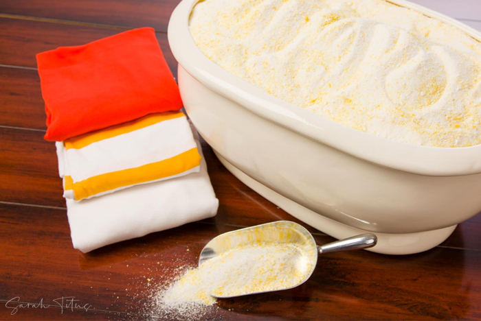 Make your own cost effective powder laundry detergent with essential oils and a few ingredients so you can save money while having fresh smelling, super clean clothes! All natural products, non-toxic.